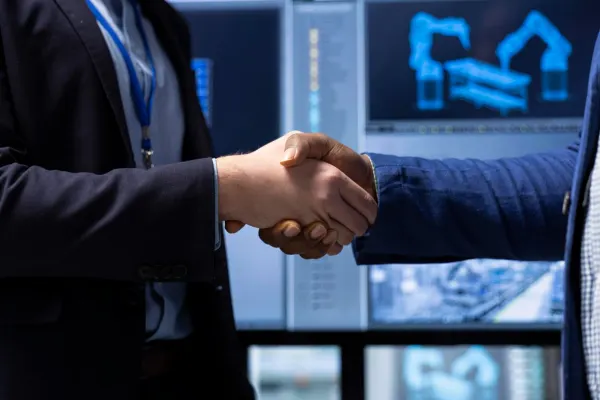 Handshake between business professionals symbolizing trust, successful partnerships, long-term collaboration, and client confidence.